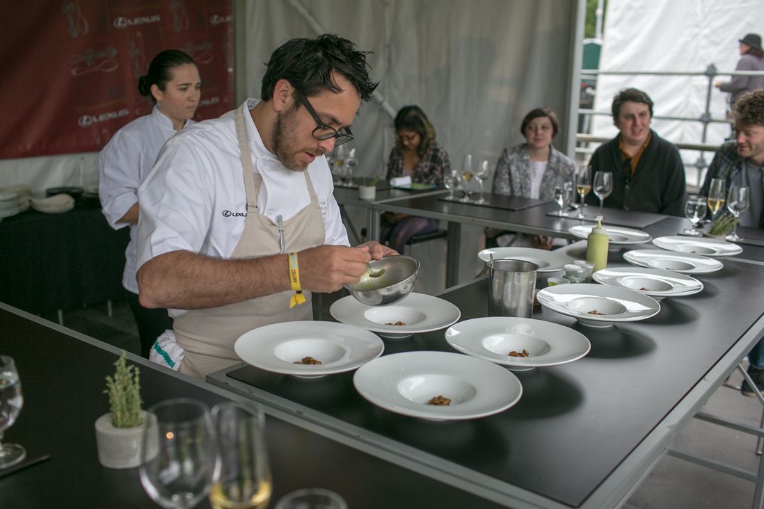 Chef Christopher Kostow of Napa Valley's Meadowood restaurant cooked for GoogaMooga's most rarified audience of media and contest winners. Other foodies had to watch on a giant screen<br/>